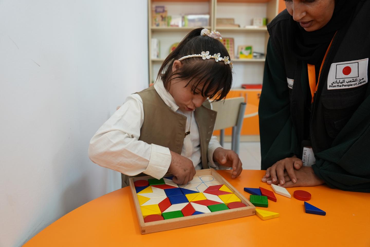 Roaa* engaging in one of her school’s learning tools in the resource room. World Vision Syria Response, Joanna Zreineh.
