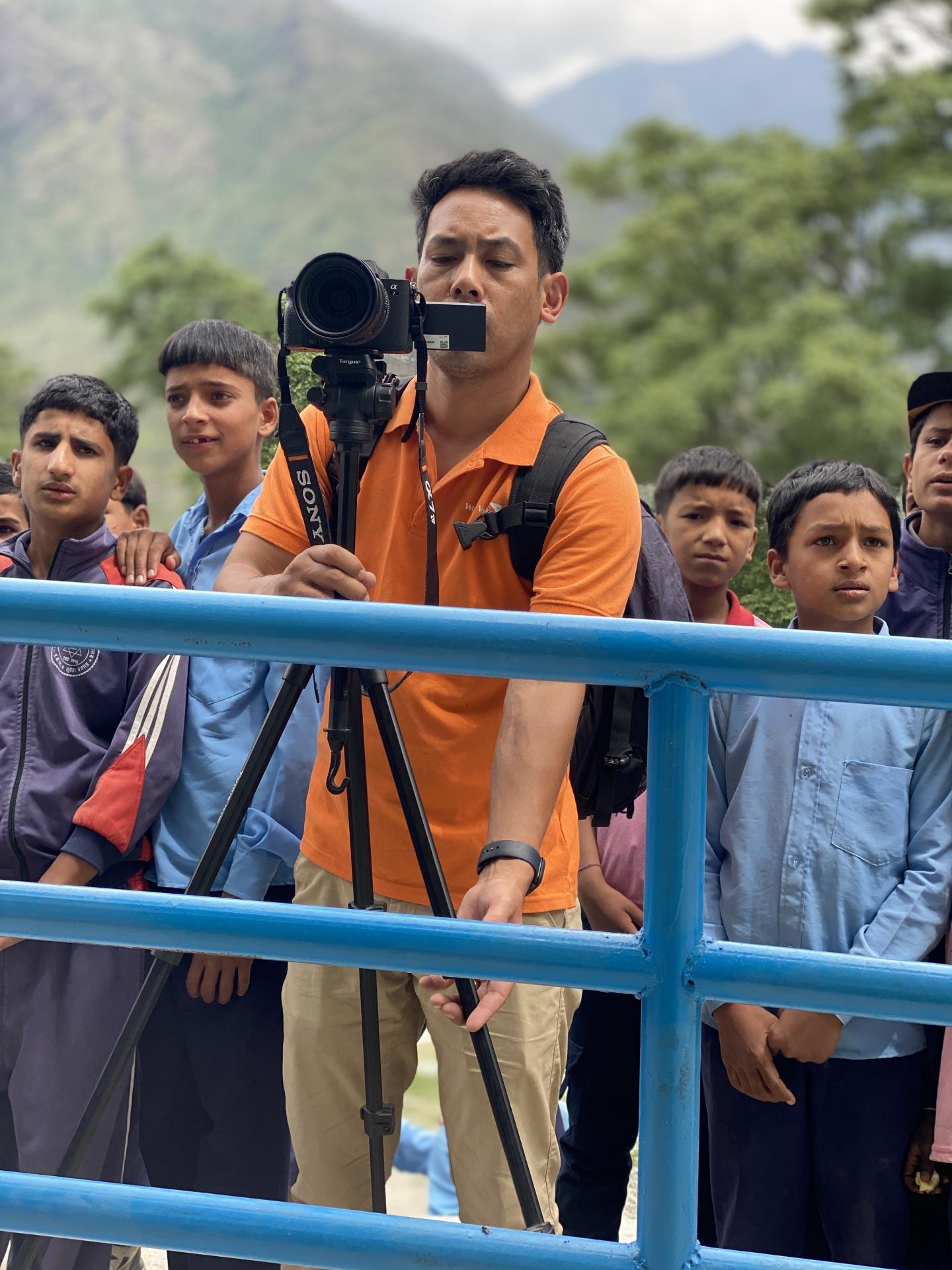 BINOD W HIS CAMERA