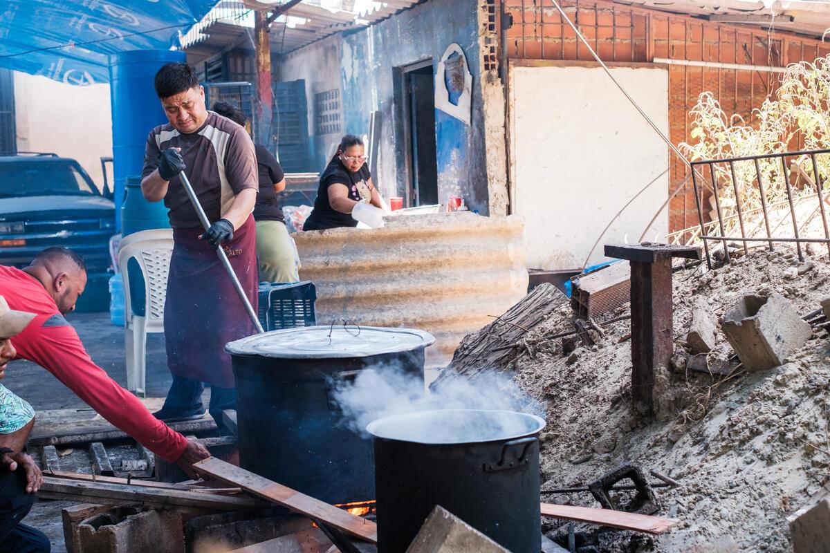 People cooking and supporting Daniela