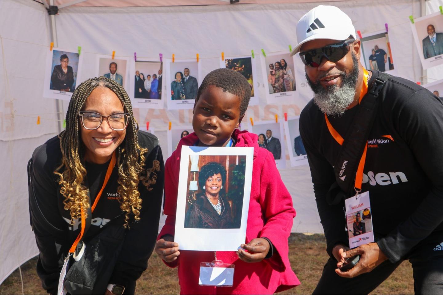 Bishop William Watson and his wife Stacy with one of the children who participated in the Chosen event