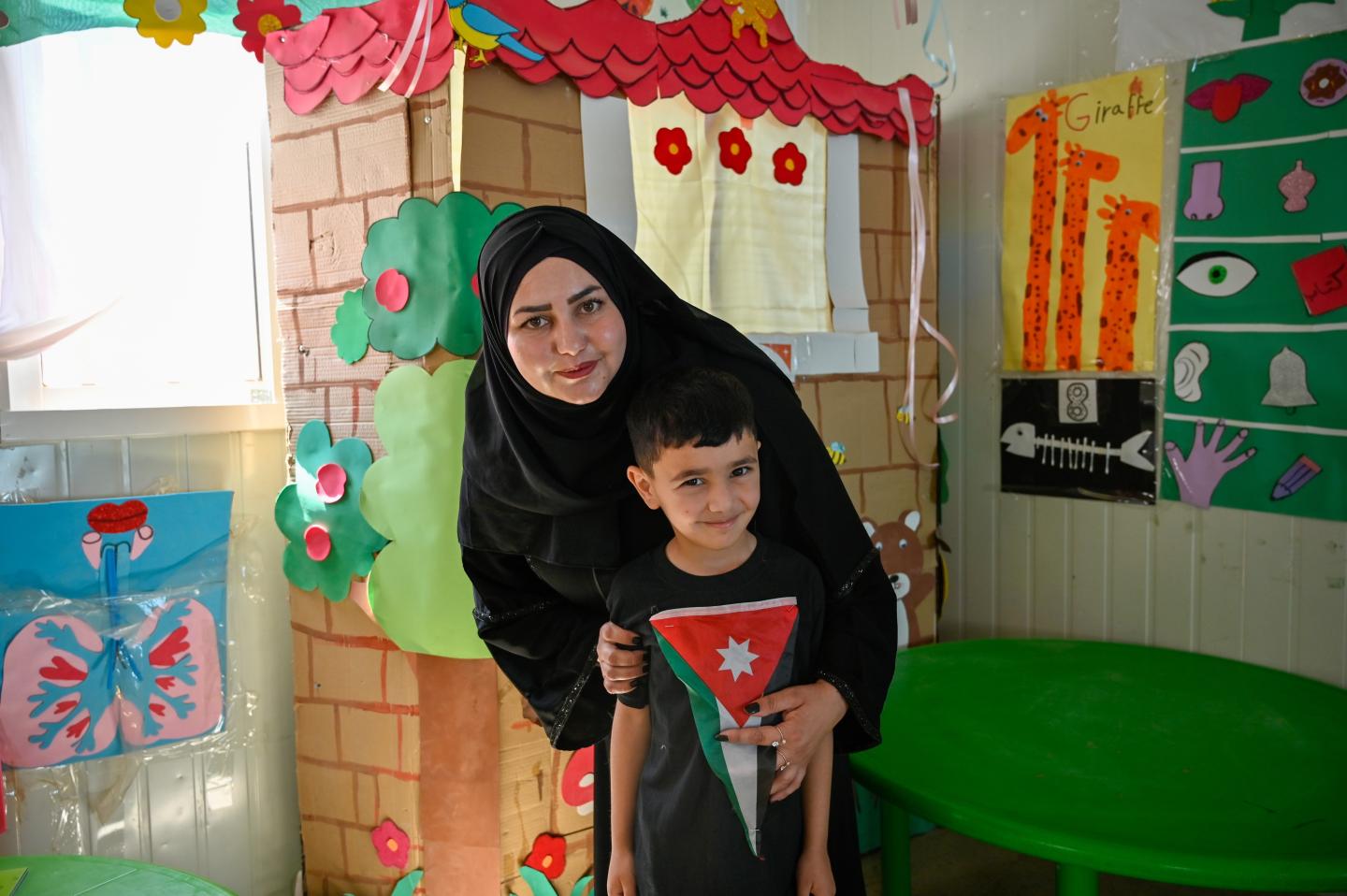 Asmaa, with her son, Rayan.