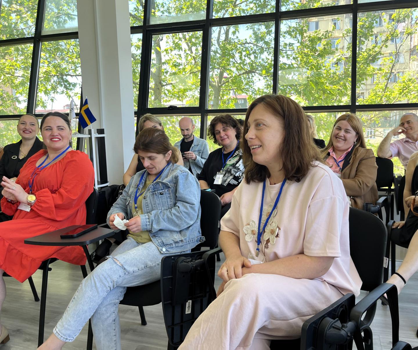 Nana attending session with other women 