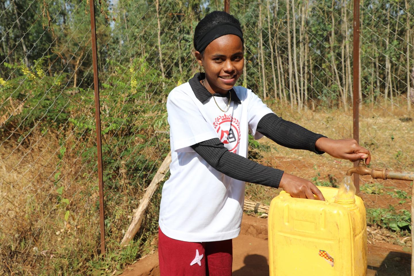 Ebbise at water point fetching water