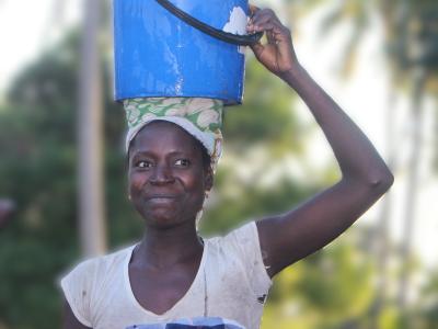 She smiles after having potable water  