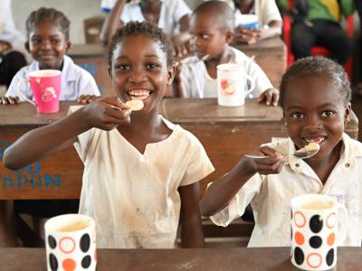 Children eating porridge