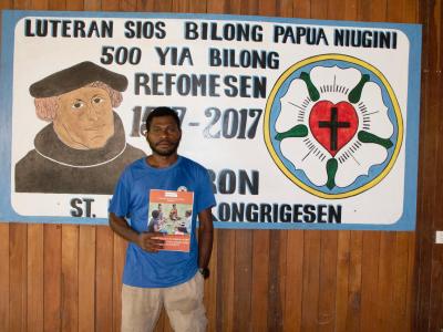 Clause standing at the Lutheran Church at Amron Lutheran Station