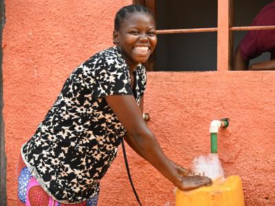 Eugenie fetching water