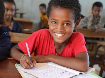 Abdi at school attending class