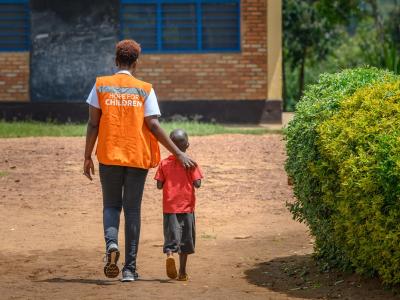 WV Rwanda Staff with Children