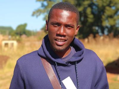 Malibongwe standing outside the Inkhundla centre during the RHM training.