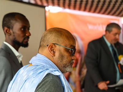 The National Director of World Vision Mauritania speaks during a media event held under a traditional tent in Nouakchott, June 2025.