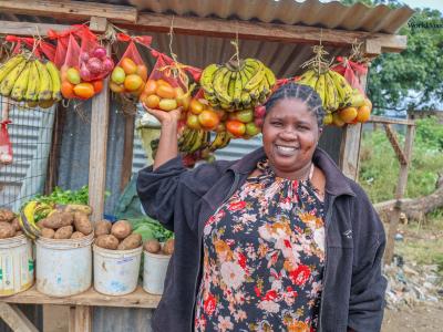 Felister Mwikali beams with pride at her well-stocked grocery stall in Oldonyo Orok, Kajiado County ©World Vision Photo/Mirriam Kioko