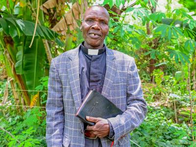 Pastor Wilson Kilimo, a devoted spiritual leader, small-scale farmer, and passionate environmentalist, is championing the practice of Farmer Managed Natural Regeneration (FMNR) to restore the environment and uplift his community. ©World Vision Photo/Hellen Owuor