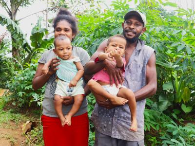  Little Joshua (Red Shirt) with parents and younger brother
