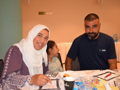 Ahmed*, Dua* and their daughter Leila* during the workshop