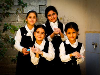 Children in Iraq washing hands