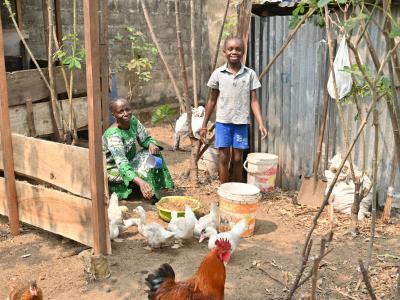 Angelique and her daughter in their farm