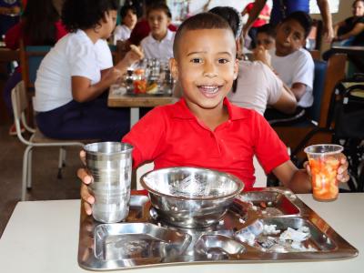 A child in Delta Amacuro, Venezuela enjoys a nutritious lunch through World Vision’s school meals programme.