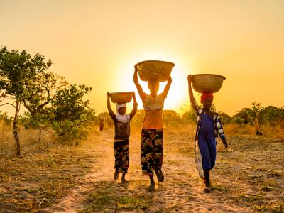 Women and girls walk together to collect water in Dambakura village, West Gonja AP, Ghana.