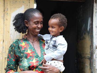 Kendehaftey and her daughter Arsema at their doorway