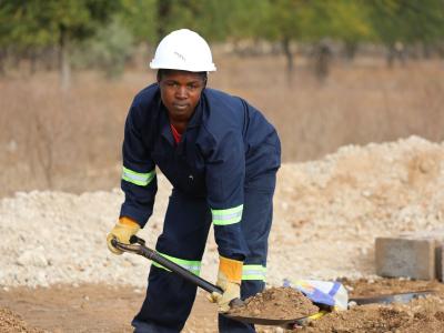 Woman mason working in sanitation marketing