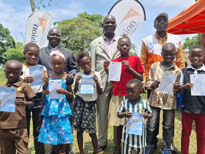 Children after receiving their registration documents 