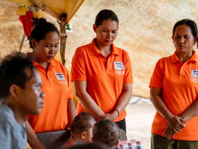 45-year-old Ma Sopheap, serving as a Community Accountability Facilitator, empowering others to seek health and education services.