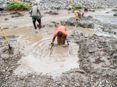 Women working in an artisanal mining site