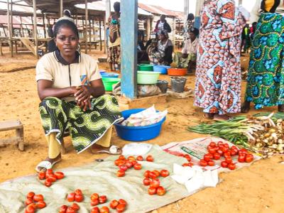 Neema selling some vegetables