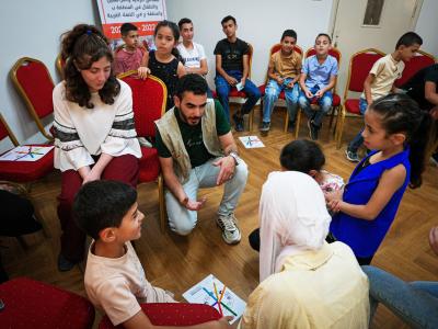 Palestinian Children take part in a psychosocial support session