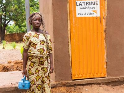 A latrine, a new life for Ernestine.