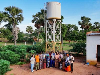 The regional director with members of the Korkoin Water Management Committee