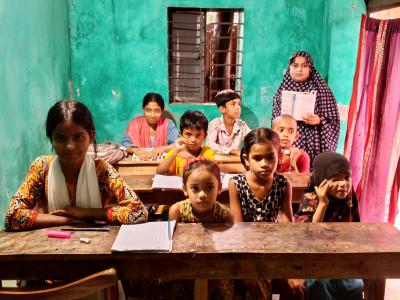 Chameli with her students in her home classroom in Khulna, Bangladesh.