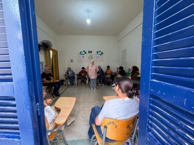 A group of youth in Tripoli, participating in an IMPACT+ session inside a classroom, because every child deserves a place where they can discover their potential and grow with confidence.