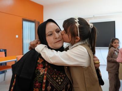 Roaa* with her mother in the resource room