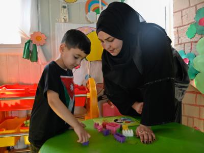 Asmaa, with her son, Rayan.