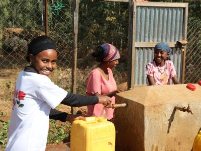 Ebbise and her friends fetching water