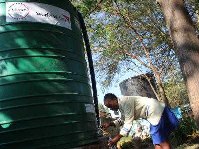 school children accessing clean water in schools