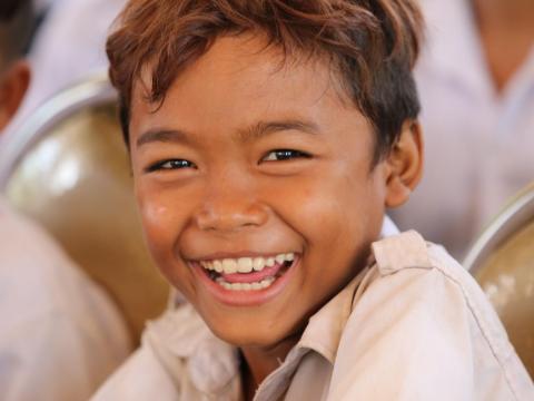Khmer boy laughing at the camera