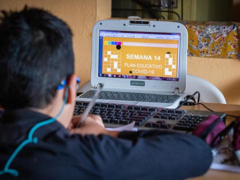 Boy learning online during COVID-19
