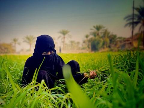 Hanaa in the vast green field.