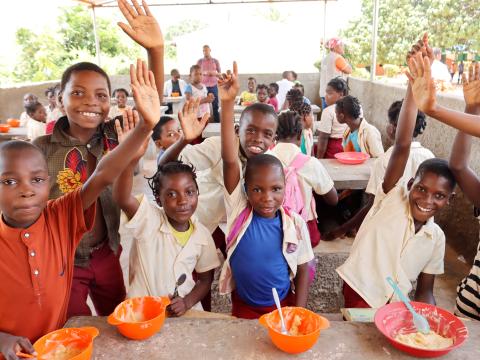 children enjoying their school meals