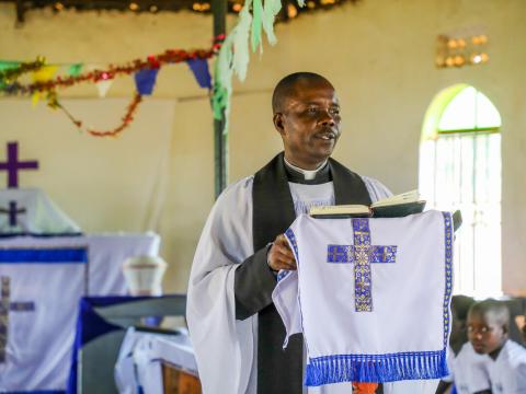 Rev, Jackson leading a church service