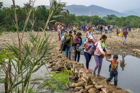 Venezuelans crossing the border to Colombia