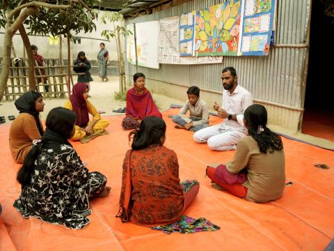 Joy, a Youth Climate Advocate and Child and Youth Forum member, leading an awareness session with community youth in Biral, Dinajpur.