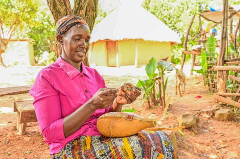 When she’s not tending her farm, Irene makes beaded bracelets and traditional gourds used for fermenting milk. ©World Vision Photo/Hellen Owuor