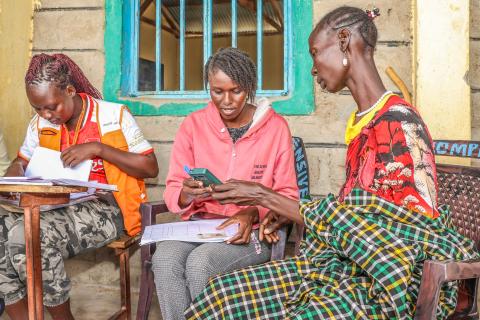 Field enumerators verify Lokolita’s details during the household validation exercise in Turkana Central, part of the process to ensure drought-affected families receive cash assistance support. ©World Vision Photo/Mirriam Kioko