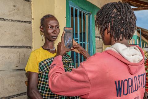 The validation process includes photo verification to help ensure cash assistance reaches vulnerable drought-affected households in Turkana. ©World Vision Photo/Mirriam Kioko 