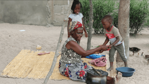Salfina with her grandchildren 