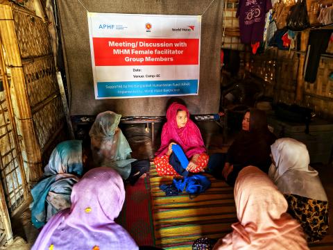 Humaira with community people in a session